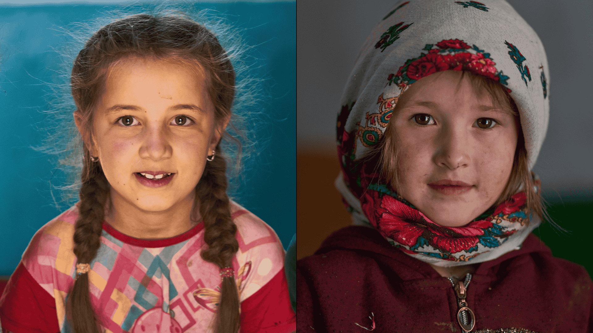 Portrait of two young girls from Jizev Valley, Tajikistan. The girl on the left has braided hair and wears a colorful shirt with a bright smile. The girl on the right is dressed warmly in a maroon outfit and floral-patterned headscarf, looking thoughtfully into the camera.